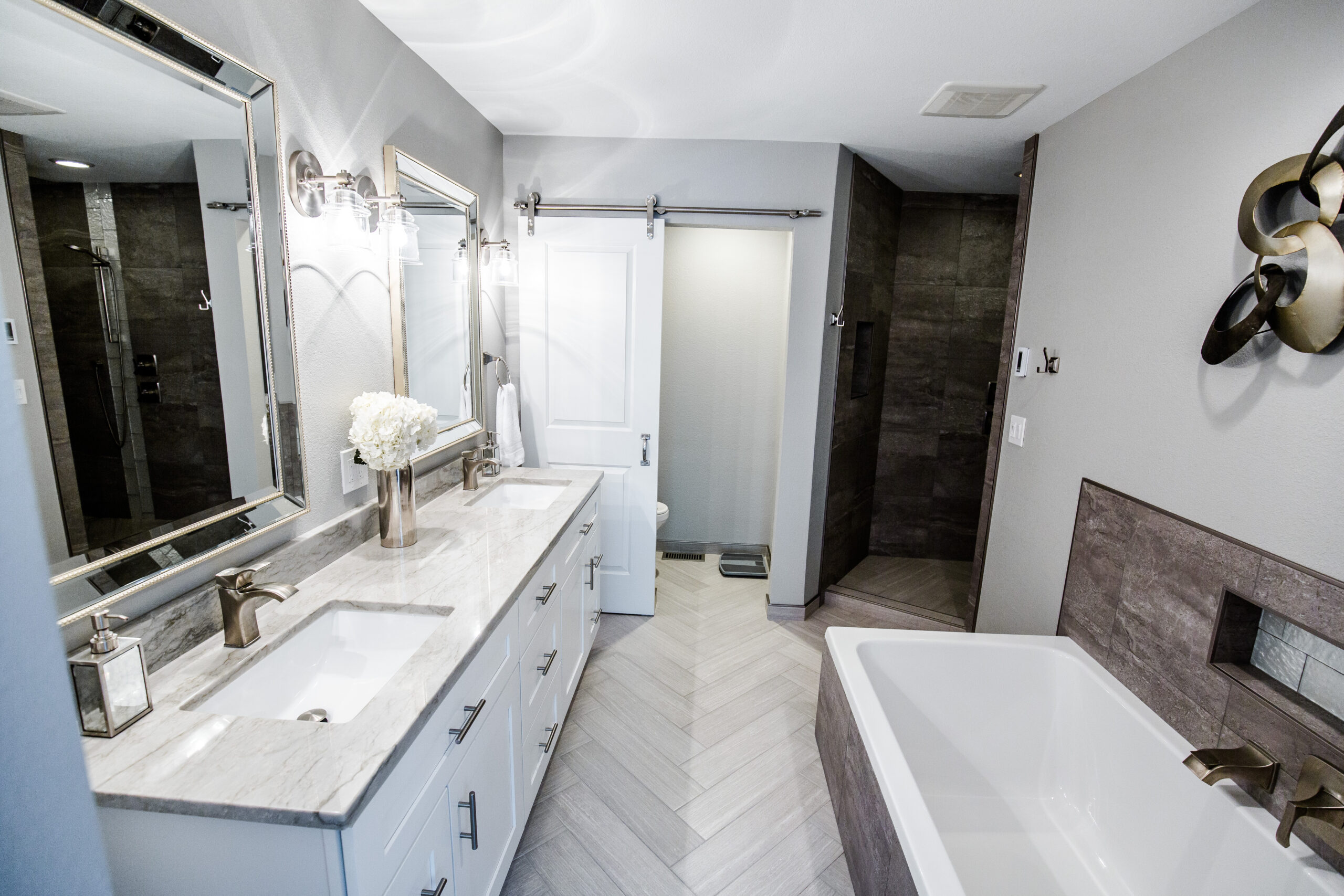 Herringbone tile bathroom