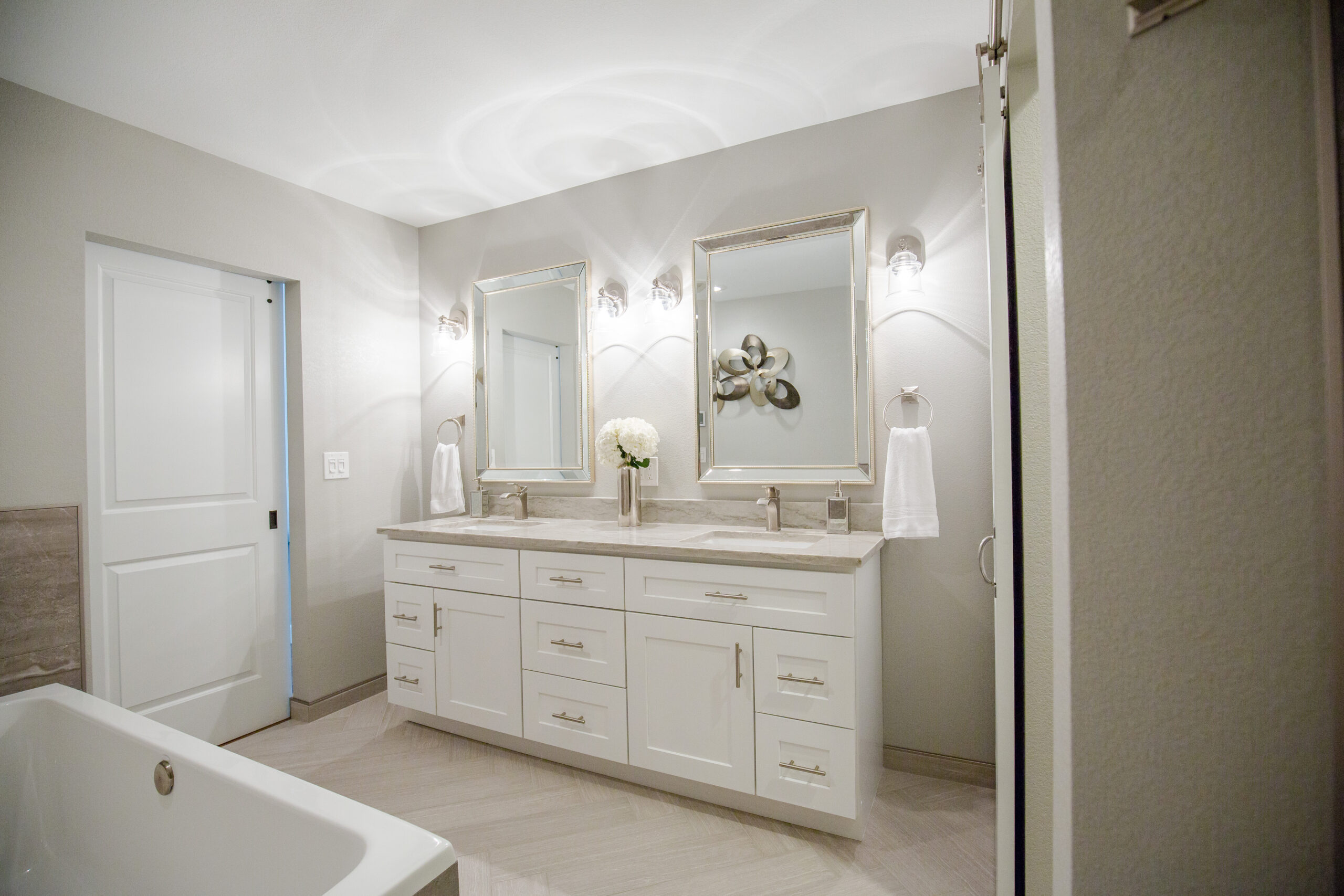 White cabinetry bathroom